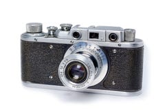 Gammal för filmfoto för tappning som 35mm kamera isoleras på vit bakgrund fotografering för bildbyråer Gammal för filmfoto för tappning som 35mm kamera isoleras på vit bakgrund fotografering för bildbyråer