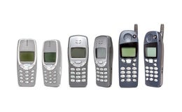Gammal mobiltelefon på vit bakgrund fotografering för bildbyråer Gammal mobiltelefon på vit bakgrund fotografering för bildbyråer