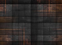 Gammal mörk wood textur med fyrkantiga modeller royaltyfri foto Gammal mörk wood textur med fyrkantiga modeller royaltyfri foto