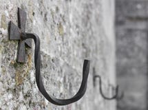 Gancho del hierro en la pared fotografía de archivo libre de regalías Gancho del hierro en la pared fotografía de archivo libre de regalías