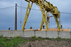 A gantry crane with workers stock images A gantry crane with workers stock images