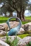 Garden copper figure of heron bronze statue in the royalty free stock photography Garden copper figure of heron bronze statue in the royalty free stock photography