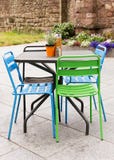 Garden Table And Chair On Patio Royalty Free Stock Images