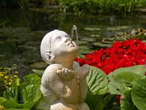 Garden Water Fountain Figurine Of A Boy Stock Photo