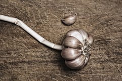 Garlic On Wooden Table. Stock Photos