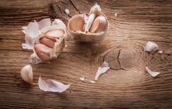 Image result for garlic on wooden table