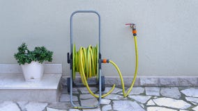 Gartenschlauch f?r Bew?sserung lizenzfreies stockfoto Gartenschlauch f?r Bew?sserung lizenzfreies stockfoto