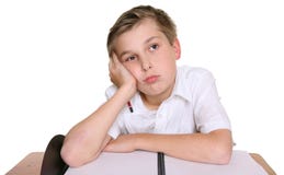 Garçon d'école détruit dans la pensée photo libre de droits Garçon d'école détruit dans la pensée photo libre de droits