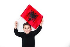 Garçon patriote avec le drapeau albanais Image libre de droits Garçon patriote avec le drapeau albanais Image libre de droits