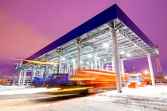 Gas station at oil refinery factory night time Stock Images Gas station at oil refinery factory night time Stock Images