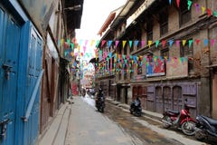 Gatan runt om den Patan Durbar fyrkanten, ett UNESCOarv i Kathmandu Valley arkivfoto Gatan runt om den Patan Durbar fyrkanten, ett UNESCOarv i Kathmandu Valley arkivfoto