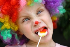 Gekke Clown Child met Lolly royalty-vrije stock foto's Gekke Clown Child met Lolly royalty-vrije stock foto's