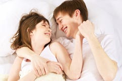 Gelächter im Bett lizenzfreies stockfoto Gelächter im Bett lizenzfreies stockfoto