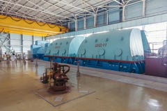 Generador de Turbo con el hidrógeno que se refresca en el cuarto de la maquinaria de la central nuclear imagenes de archivo Generador de Turbo con el hidrógeno que se refresca en el cuarto de la maquinaria de la central nuclear imagenes de archivo