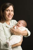 Generi il bambino della holding. fotografie stock Generi il bambino della holding. fotografie stock