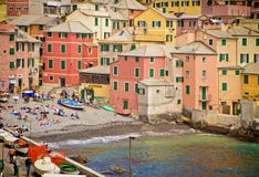 Genoa, Italy - bathers on the small shore of the Boccadasse bay