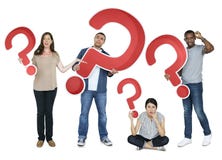 Gente diversa que lleva a cabo iconos del signo de interrogación fotos de archivo Gente diversa que lleva a cabo iconos del signo de interrogación fotos de archivo