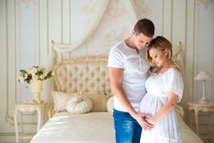 Gentle Beautiful Pregnant Couple Near Tulle Curtains Royalty Free Stock Photo Gentle Beautiful Pregnant Couple Near Tulle Curtains Royalty Free Stock Photo
