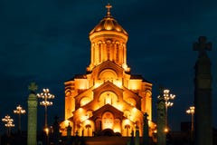 Georgia, Tbilisi - 05.02.2019. - Famous Orthodox Holy Trinitiy Sameba church illuminated with golden light. Night time photography royalty free stock photo Georgia, Tbilisi - 05.02.2019. - Famous Orthodox Holy Trinitiy Sameba church illuminated with golden light. Night time photography royalty free stock photo
