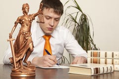 Gerechtigkeitsstatue und -rechtsanwalt Lizenzfreie Stockbilder Gerechtigkeitsstatue und -rechtsanwalt Lizenzfreie Stockbilder