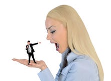Geschäftsfrau, die auf kleinem Mann entsetzt schaut Stockbilder Geschäftsfrau, die auf kleinem Mann entsetzt schaut Stockbilder