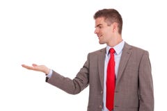 Geschäftsmannholding etwas in der Hand Stockbild Geschäftsmannholding etwas in der Hand Stockbild