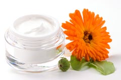 Gesichtssahne und Calendulablume Lizenzfreie Stockfotos Gesichtssahne und Calendulablume Lizenzfreie Stockfotos