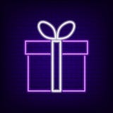Gift box neon sign. Bright neon night signboard for sale of holiday advertising. Vector vector illustration Gift box neon sign. Bright neon night signboard for sale of holiday advertising. Vector vector illustration