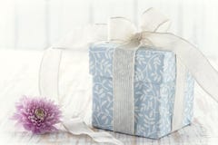Gift Box Tied Up With White Ribbon And Pink Flower Stock Images Gift Box Tied Up With White Ribbon And Pink Flower Stock Images