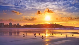 Gijon skyline sunset in San Lorenzo beach Asturias royalty free stock images Gijon skyline sunset in San Lorenzo beach Asturias royalty free stock images
