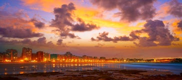 Gijon skyline sunset in San Lorenzo beach Asturias stock image Gijon skyline sunset in San Lorenzo beach Asturias stock image