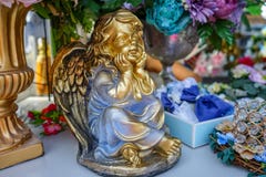 The gilded figure of an angel with wings stock images The gilded figure of an angel with wings stock images