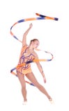 Gimnasta flexible hermoso de la muchacha con una cinta gimnástica sobre whi imagen de archivo Gimnasta flexible hermoso de la muchacha con una cinta gimnástica sobre whi imagen de archivo