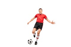 Giovane giocatore di football americano risoluto che spara una palla Fotografia Stock Libera da Diritti Giovane giocatore di football americano risoluto che spara una palla Fotografia Stock Libera da Diritti
