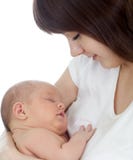 Giovane holding della madre il suo bambino appena nato fotografie stock libere da diritti Giovane holding della madre il suo bambino appena nato fotografie stock libere da diritti