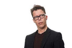 Giovane uomo d'affari premuroso che esamina distanza immagine stock libera da diritti Giovane uomo d'affari premuroso che esamina distanza immagine stock libera da diritti