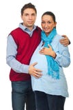Giovani coppie incinte amorose Fotografia Stock Giovani coppie incinte amorose Fotografia Stock