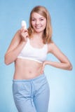 Girl applying stick deodorant in armpit. Skin care Royalty Free Stock Images Girl applying stick deodorant in armpit. Skin care Royalty Free Stock Images