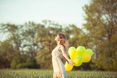 Girl with baloons