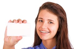Girl with braces presenting business card royalty free stock photography Girl with braces presenting business card royalty free stock photography