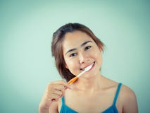 Beautiful girl brushing her teeth royalty free stock photography Beautiful girl brushing her teeth royalty free stock photography