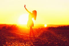 Girl dancing at sunset on the beach royalty free stock photo Girl dancing at sunset on the beach royalty free stock photo