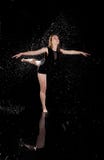 Girl dancing water ballet black background stock images Girl dancing water ballet black background stock images