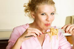 Girl Eating Spaghetti Stock Images