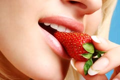 Girl eating a strawberry 02