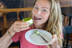 The girl eats cake, the cool girl with cake. Stock Photos The girl eats cake, the cool girl with cake. Stock Photos