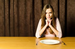 Girl with empty plate