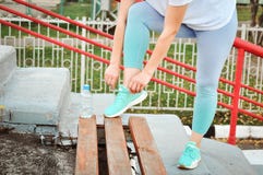 Active girl with excess weight is going to go in for sports to lose weight at the stadium. Healthy lifestyle. royalty free stock photo Active girl with excess weight is going to go in for sports to lose weight at the stadium. Healthy lifestyle. royalty free stock photo