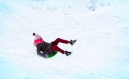 girl flies on a slide from an ice slide royalty free stock photos girl flies on a slide from an ice slide royalty free stock photos