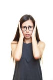Stressed young business woman covering her ears isolated on whit royalty free stock photos Stressed young business woman covering her ears isolated on whit royalty free stock photos